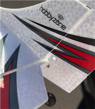 Folding raked wingtip